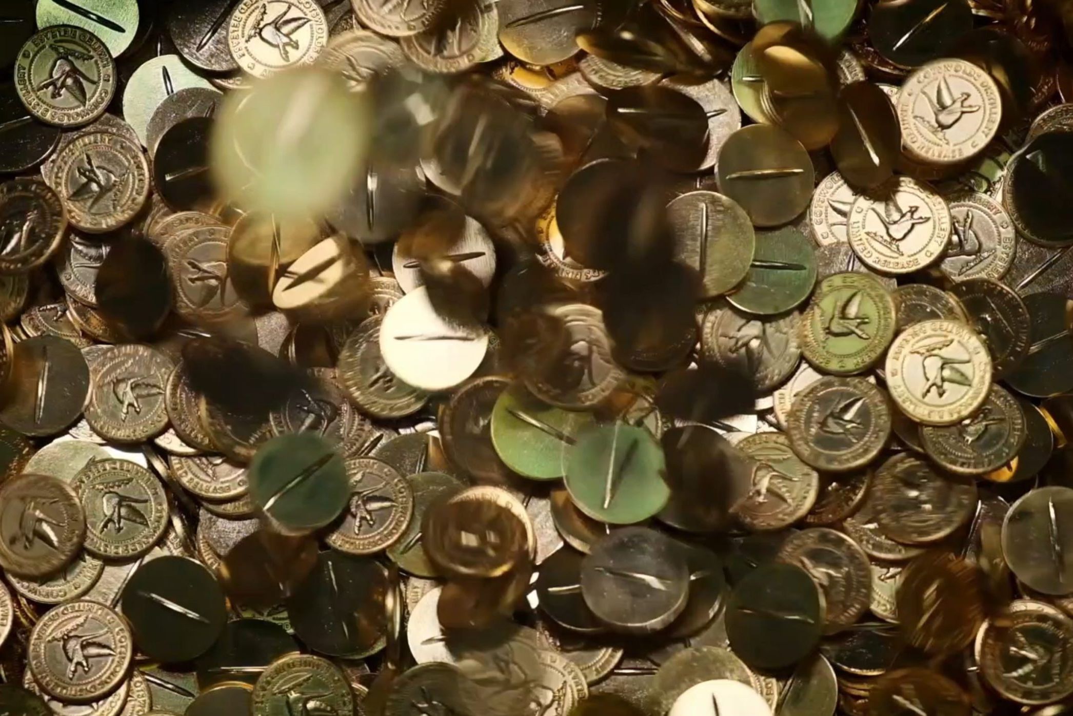 Decorative gold coins used as part of a high-end brand display